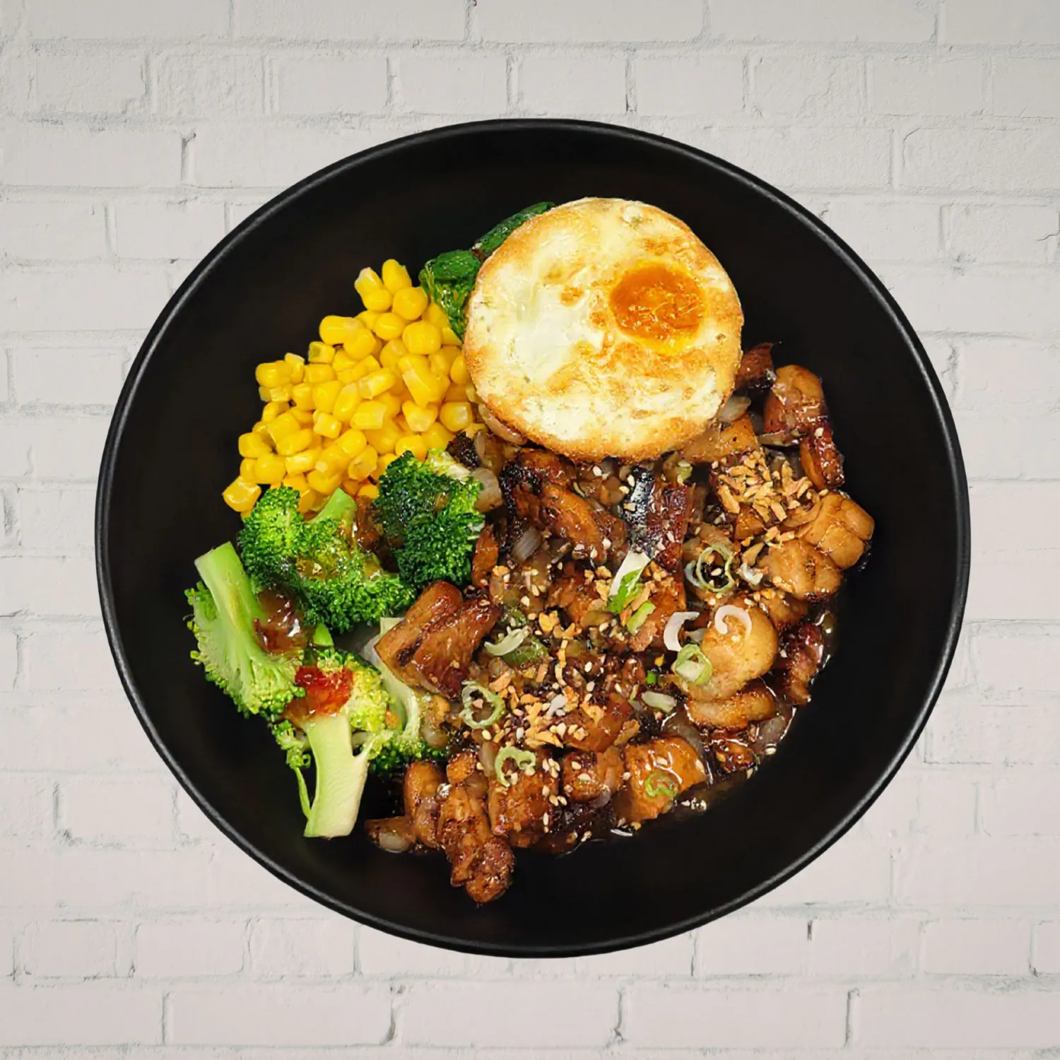 Spicy glazed chicken with rice, egg and veggies at Kaiju Ramen & Curry, a Japanese Curry Restaurant in Isla Vista